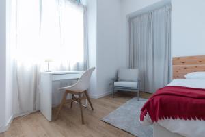 Postel nebo postele na pokoji v ubytování Lagoa Hostel & Suites