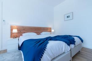 Postel nebo postele na pokoji v ubytování Lagoa Hostel & Suites