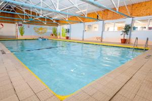 The swimming pool at or close to 46 Gower Holiday Village