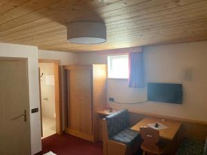 TV a/nebo společenská místnost v ubytování Hotel Fortuna
