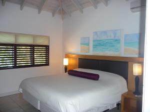 Voodi või voodid majutusasutuse Buccaneer Beach Club toas