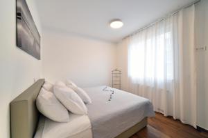 Posteľ alebo postele v izbe v ubytovaní On Time Apartment