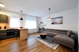 Kuchyňa alebo kuchynka v ubytovaní On Time Apartment