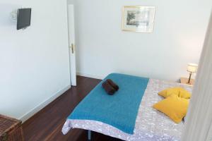 Posteľ alebo postele v izbe v ubytovaní La plaza apartment