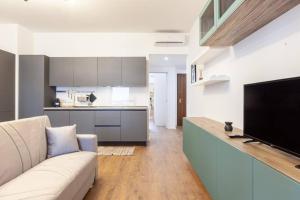 Kuchyňa alebo kuchynka v ubytovaní Lazzi - A.C. - Wi-Fi - Flexyrent Apartment