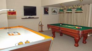 A pool table at The Ultimate Villa on Windsor Hills Resort, Orlando Villa 4768