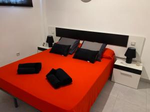 Postel nebo postele na pokoji v ubytování La dama gris - Fuerteventura Holiday Wi-Fi