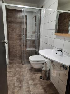 Koupelna v ubytování Apartmány Resort Na Horské