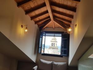 Część wypoczynkowa w obiekcie Apartamentos Turísticos y Habitaciones Cidade Vella by Bossh! Hotels