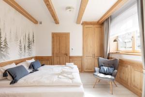 Łóżko lub łóżka w pokoju w obiekcie Apartamenty Franka Zakopane