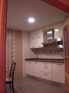 Kuchyň nebo kuchyňský kout v ubytování Casa Rural Carmina