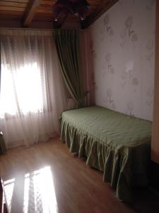 Postel nebo postele na pokoji v ubytování Casa Rural Carmina