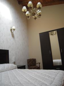 Postel nebo postele na pokoji v ubytování Casa Rural Carmina