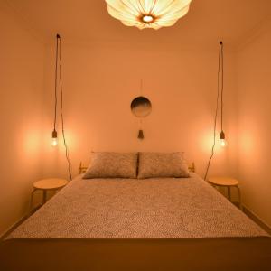 Ліжко або ліжка в номері Cimo do Monte - casa rústica na aldeia