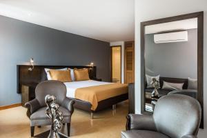 Postel nebo postele na pokoji v ubytování Hotel Egina Medellin
