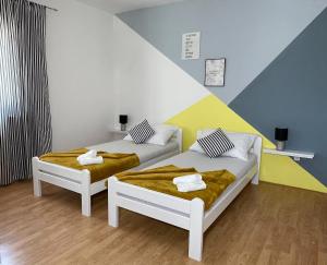 Posteľ alebo postele v izbe v ubytovaní Villa Enjoy