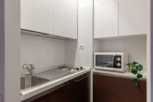 Kuchnia lub aneks kuchenny w obiekcie iFlat Via del Corso Elegant Apartment