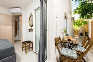 Et opholdsområde på Iliana & Sarra Apartment 1