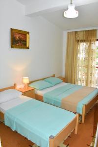 Postel nebo postele na pokoji v ubytování Guesthouse Elsa