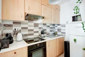 A kitchen or kitchenette at Santa Barbara 27 Canyelles Roses - Immo Barneda