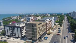 an aerial view of a city with buildings and a street at Aparthotel Nevada - Apartamente in Constanţa