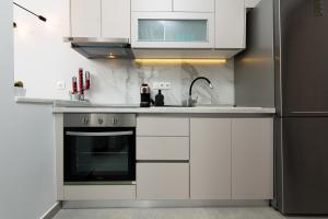 Køkken eller tekøkken på Iliana & Sarra Apartment 2 + 19 billeder