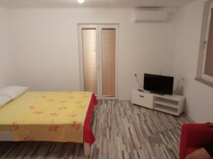 Postel nebo postele na pokoji v ubytování Studio apartman Matković