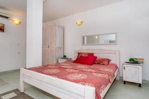 Postel nebo postele na pokoji v ubytování Apartmani LIRA