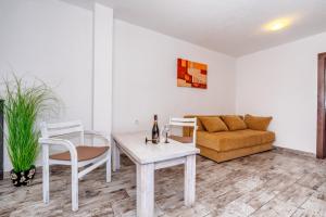 Posezení v ubytování Apartmani LIRA