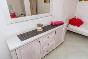 Postel nebo postele na pokoji v ubytování Apartmani LIRA