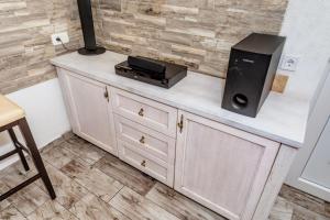 Kuchyň nebo kuchyňský kout v ubytování Apartmani LIRA