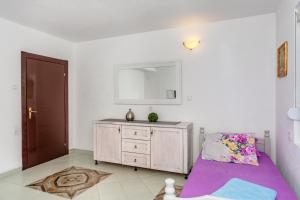 Postel nebo postele na pokoji v ubytování Apartmani LIRA + 37 fotografií