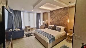 Ένα ή περισσότερα κρεβάτια σε δωμάτιο στο THE POOL LABONE