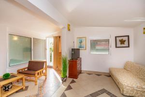 TV a/nebo společenská místnost v ubytování Apartmani LIRA