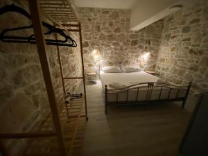 Postel nebo postele na pokoji v ubytování Lemons&Olives Rooms