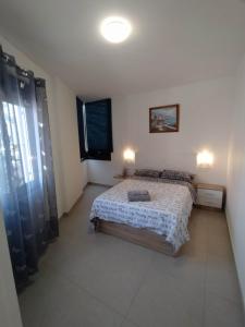 A bed or beds in a room at Remanso Urbano