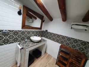 A kitchen or kitchenette at Casa Rural Hospitalero