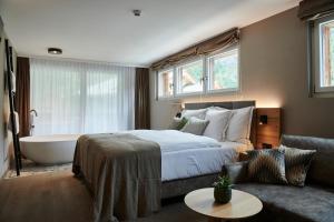 Katil atau katil-katil dalam bilik di Matthiol Boutique Hotel