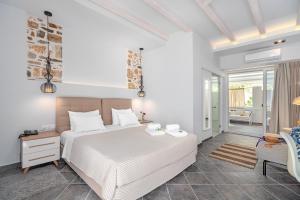 Postel nebo postele na pokoji v ubytování Hotel Lido Thassos