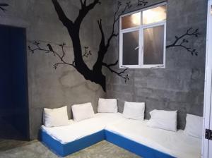 Postel nebo postele na pokoji v ubytování Cycling Backpacker Hostel + 23 fotografií