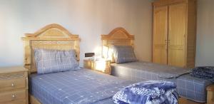 Postel nebo postele na pokoji v ubytování Superbe Appartement bouki