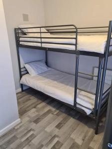 a couple of bunk beds in a room at Next to Liverpool Stadium in Liverpool