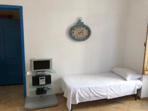 En eller flere senge i et værelse på Il Cortiletto - Lipari CENTRO + 4 billeder