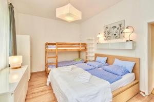 Bunk bed o mga bunk bed sa kuwarto sa Payerbach Apartments