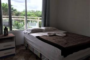 A bed or beds in a room at CASA VACACIONAL DE PLAYA