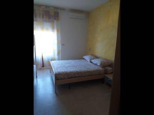 Posteľ alebo postele v izbe v ubytovaní Room in BB - Quadruple room in Pineto - A few meters from the sea