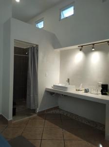 Ванная комната в Carlota Guest House