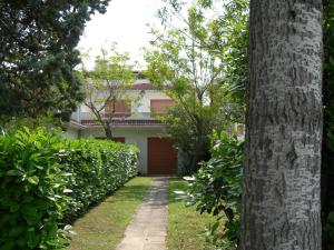 Fotografia z galérie ubytovania Charming villa with private garden v destinácii Porto Santa Margherita di Caorle