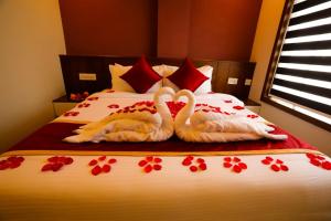 Zubis Inn Hotel客房内的一张或多张床位