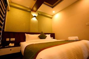 Zubis Inn Hotel客房内的一张或多张床位